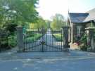 Entrance gates to Graves Park from Hemsworth Road showing (right) Bolehill Lodge