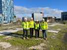 Chris West, Head of Operations at Keltbray, Louise Pavitt, Major Project Director at Keltbray, Lucia Lorente-Arnau, Principal Development Officer and Councillor Ben Miskell, on the site of Sheffield Castle