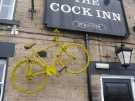 Bicycle mounted to celebrate the 2014 visit of the Tour de France cycle road race, Cock Inn, No. 5 Bridge Hill, Oughtibridge