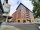 Travelodge Hotel and Qpark car park, from Dixon Lane looking towards Broad Street West