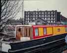 Narrowboat undergoing renovation at the quayside looking towards the Straddle Warehouse, Sheffield Canal Basin (later Victoria Quays) Narrowboat undergoing renovation at the quayside looking towards the Straddle Warehouse, Sheffield Canal Basin (later Victoria Quays)