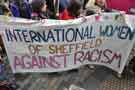 Banner of the International Women of Sheffield Against Racism at the demonstration against Racism and in support of refugees, Peace Gardens
