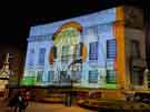 Light show projecting Pete McKee art work onto the Central Library, Tudor Square