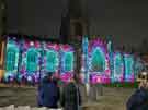 Light show projecting art work onto Sheffield Cathedral, Church Street