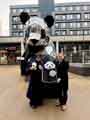 The Chinese Consul General from the Manchester Consulate, Tang Rui, presenting the Lord Mayor of Sheffield, with a panda statue on behalf of Chengdu City Government