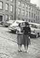 Dorothy and Marie [outside the offices of] Joshua Wortley Accountants, Paradise Square