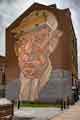 Brick mosaic mural, depicting a Sheffield steelworker on a building gable end, No. 11 Castle Street, created by artist Paul Waplington Brick mosaic mural, depicting a Sheffield steelworker on a building gable end, No. 11 Castle Street, created by artist Paul Waplington