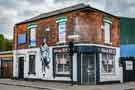 Crusty Cob sandwich shop, No. 72 Burton Road and junction with (left) Percy Road and also showing (unidentified mural) Crusty Cob sandwich shop, No. 72 Burton Road and junction with (left) Percy Road and also showing (unidentified mural)
