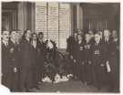 First World War veterans (wearing medals) in front of war memorial at  Canada House, (the former Sheffield Gas Company offices), Commercial Street, Sheffield, [c.1930s]