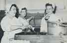 Batchelors Foods Ltd., Sheffield factory: Flo Williams, Lily Beal and Elsie Peal, Batchelors works canteen kitchen, [Limestone Cottage Lane], Sheffield