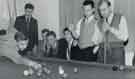 Batchelors Foods Ltd., Sheffield factory: Chris Moorman, (taking a shot), and waiting to play, (l. to r.) Brian Hill and Alec Cooper in the factory recreation room, [Limestone Cottage Lane], Sheffield