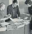 Batchelors Foods Ltd., Sheffield factory: (l. to r.) K. Vessey, E. Cook and J. Hamilton sorting periodicals for circulation among members of the magazines section of the Sports and Social Club Batchelors Foods Ltd., Sheffield factory: (l. to r.) K. Vessey, E. Cook and J. Hamilton sorting periodicals for circulation among members of the magazines section of the Sports and Social Club