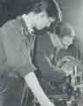 Batchelors Foods Ltd., Sheffield Factory. Tradesman turner, Mr Alan Gilpin shows apprentice fitter, Mr David Fox how to use a lathe at the Sheffield factory during the making of a new part for a vining machine