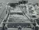 Batchelors Foods Ltd., Sheffield Factory. Rhubarb sticks being graded, [Limestone Cottage Lane, Wadsley Bridge]