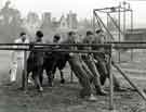 Miners exercising with (left) physiotherapist, Miners Rehabilitation Centre, Royal Infirmary Firbeck Annexe, Firbeck Hall Miners exercising with (left) physiotherapist, Miners Rehabilitation Centre, Royal Infirmary Firbeck Annexe, Firbeck Hall
