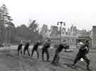 Miners exercising with (right) physiotherapist, Miners Rehabilitation Centre, Royal Infirmary Firbeck Annexe, Firbeck Hall Miners exercising with (right) physiotherapist, Miners Rehabilitation Centre, Royal Infirmary Firbeck Annexe, Firbeck Hall