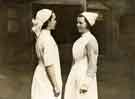 Nurse's uniforms, (left) old uniform and (right) new uniform, possibly 1930s-1940s Nurse's uniforms, (left) old uniform and (right) new uniform, possibly 1930s-1940s