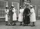 Nurses helping patients to walk, probably School of Physiotherapy, Westbourne [House], Collegiate Crescent
