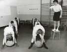 Stretching exercises, probably School of Physiotherapy, Westbourne [House], Collegiate Crescent