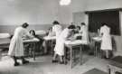 Nurses massaging forearms of patients, School of Physiotherapy, Westbourne [House], Collegiate Crescent