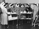 Lecturer explaing instruments on a trolley, Clarke House School of Nursing, Clarke Drive Lecturer explaing instruments on a trolley, Clarke House School of Nursing, Clarke Drive