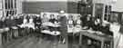 Lecturer demonstrating instruments on a trolley watched by nurses and matrons, Clarke House School of Nursing, Clarke Drive Lecturer demonstrating instruments on a trolley watched by nurses and matrons, Clarke House School of Nursing, Clarke Drive