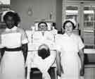 Lodge Moor Hospital. Nursing staff and patient in iron lung Lodge Moor Hospital. Nursing staff and patient in iron lung