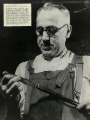 Tempering a blade at Walker and Hall Ltd., Electro Works, junction of Howard Street and Eyre Street