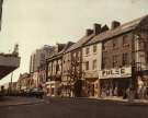 Cambridge Street showing (r. to l.) No. 8 Pulse, clothing, records and posters, No.10 J.Turner, dental surgeon, No.12 former hairdressers (scaffolding), No. 14, Picccolo Cafe, No. 16 Faulkners Billiard Hall above The Nameless Restaurant Cambridge Street showing (r. to l.) No. 8 Pulse, clothing, records and posters, No.10 J.Turner, dental surgeon, No.12 former hairdressers (scaffolding), No. 14, Picccolo Cafe, No. 16 Faulkners Billiard Hall above The Nameless Restaurant