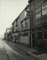 View: ov00204 Orchard Street showing (l. to r.) No. 21 Sheffield Raincoat Stores, No.23 Orchard Cafe and No. 25 Museum Hotel