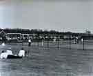 Unidentified tennis courts and pavilion
