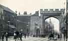 Decorative arch, West Street for the royal visit of King Edward VII and Queen Alexandra showing (left) Smith and Snape, painting and decorating contactors 
