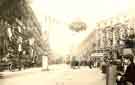View: p01343 High Street at Market Place, decorated for royal visit of King Edward VII and Queen Alexandra, Nos. 66 - 70 Bodega Co. Ltd., wine and spirit merchants