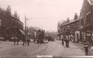 View: p01609 Tram at Darnall Tram Terminus, Staniforth Road, showing (right) No. 642, Arthur James Appleton, chemist and (left) No. 689 York City and County Bank on the corner of Irving Street