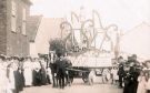 Unidentified decorated horse drawn float