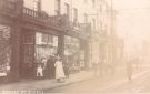 Shops on Glossop Road showing (l. to r.) J. W. Hogg, toy dealer and Johnson Brothers Ltd., dyers and cleaners