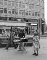 Street trader on Fargate showing (back) East Midlands Gas Board showrooms, c.1970s