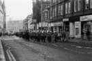 Workers march with brass band, Church Street showing (right) Refuge Assurance Building and No.43 Midland Opticians and No. 45 Smiths, drycleaners, 1970s Workers march with brass band, Church Street showing (right) Refuge Assurance Building and No.43 Midland Opticians and No. 45 Smiths, drycleaners, 1970s