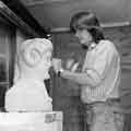 Andrew Vickers, stone carver with 'Stoneface' sculpture