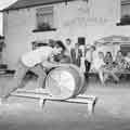 Barrel rolling at the White Hart public house, No. 27 Greenhill Main Road