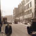View: rb00015 Fargate, showing (right) Nos. 28 - 30 Lennards Ltd., shoe retailers and Nos. 20 - 26 Proctors Ltd., house furnishers