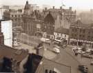 View of Fitzalan Square showing (l.to r.) Barclays Bank, Classic Cinema, The Bell Hotel, No. 9 The Sleep Shop and No. 11 Henry Wigfall and Son Ltd., house furnishers