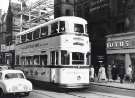 Tram 513 on Fargate showing (right) No. 21 Eagle Star Insurance Co., Fargate House and (right) No. 23 Lotus and Delta Ltd., shoe dealers