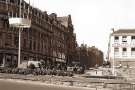 View of Leopold Street from Fargate showing (foreground) Goodwin Fountain and (l. to r.) Wilson Peck, music warehouse, Beethoven House; Marshall and Snelgrove, fashion shop; Grand Hotel and Education Department offices View of Leopold Street from Fargate showing (foreground) Goodwin Fountain and (l. to r.) Wilson Peck, music warehouse, Beethoven House; Marshall and Snelgrove, fashion shop; Grand Hotel and Education Department offices