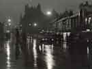 Sheaf Street at night showing (back left) the Corn Exchange