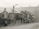 Park Hill Flats and Nos. 122 - 96 Duke Street, No. 122 Thomas Berry, chemist; No. 120 Percy Lee, newsagent; Nos. 114 - 116 William Talbot, butcher; No. 112 John Shentall Ltd., grocers, c. 1960