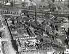 Aerial view of bomb damage in Attercliffe area showing (centre right) Sheffield Smelting Co. Ltd., Royds Mill Street