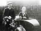 Unidentified persons in motorbike and sidecar Unidentified persons in motorbike and sidecar