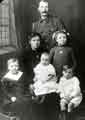Mrs Williamson of Darnall (centre) sitting on her mother's knee Mrs Williamson of Darnall (centre) sitting on her mother's knee