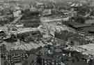 View from Hyde Park Flats of (foreground) Park and City Centre showing (centre) the construction of Sheaf Market and (right) warehouses at the Canal Basin